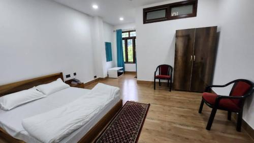 Comfortable room at our Sangti Valley Homestay